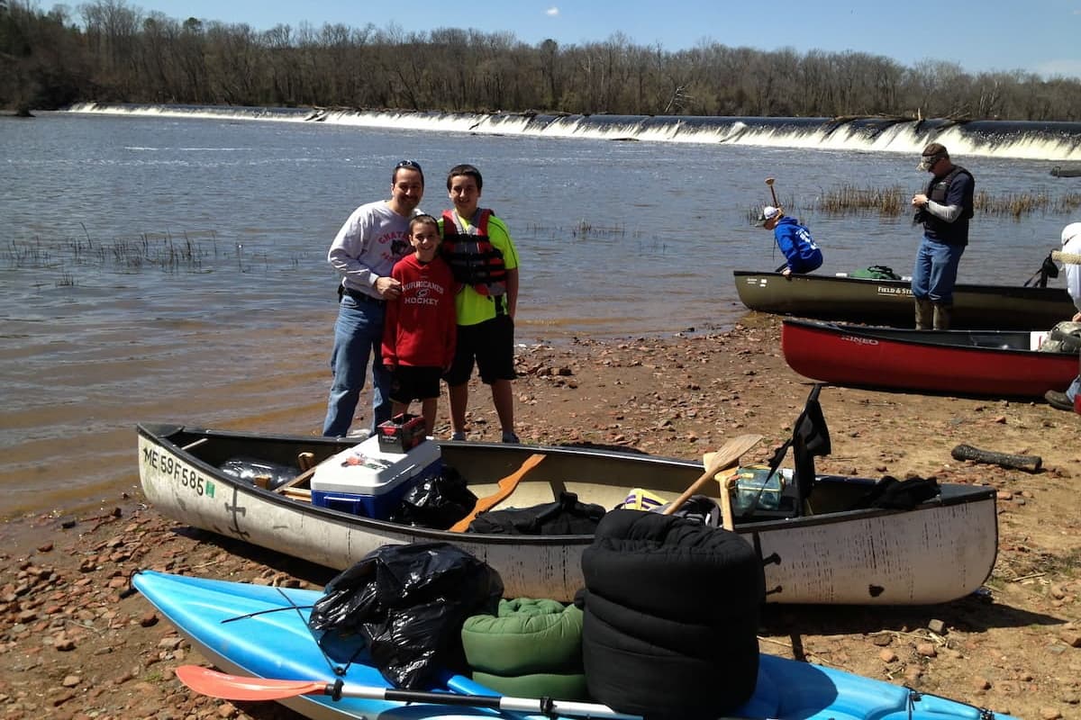 Canoers preparing to launch for overnight river trip near Buckhorn Dam on the Cape Fear River