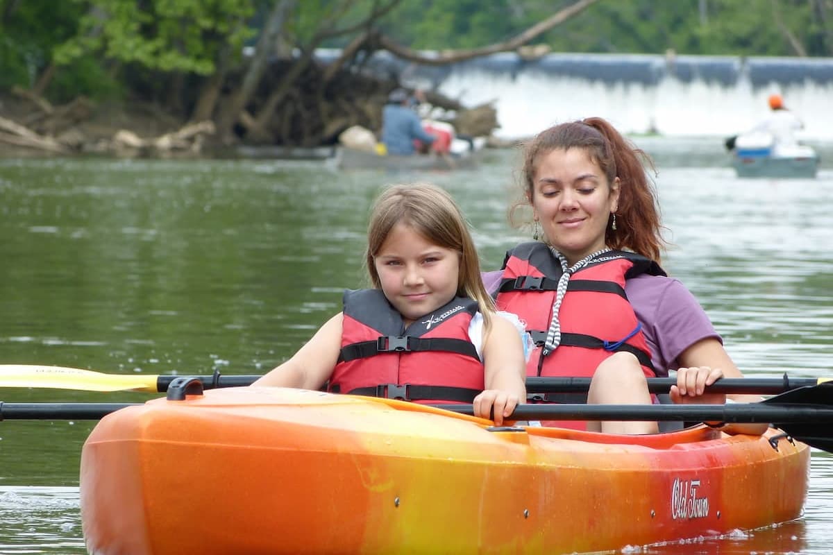 Mom and daughter kayaking together near Buckhorn Dam on Cape Fear River