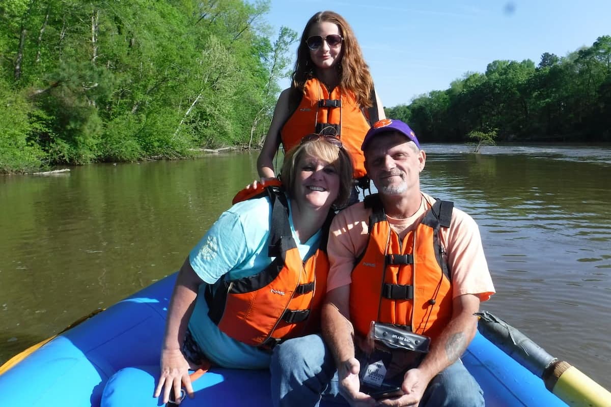 Family on a raft on the Cape Fear River near Lillington, NC