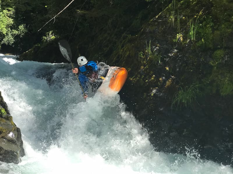 whitewater kayaker in a rapid