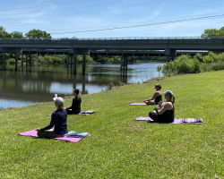 paddle board yoga on the banks of cape fear river in lillington, NC